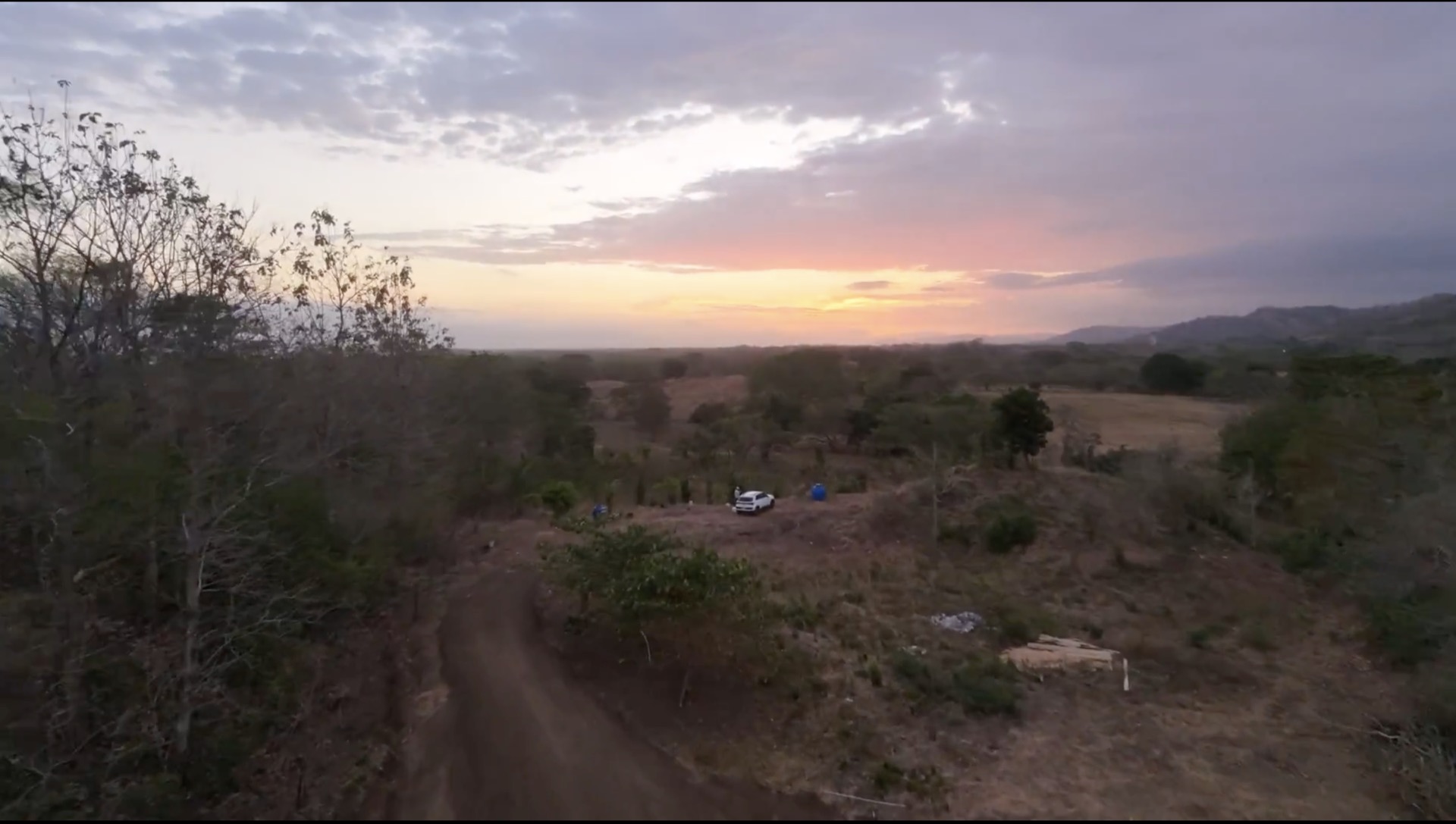 Sunset drone view over the property
